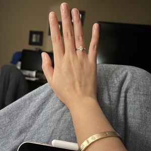 10k white gold, Moissanite 7x5mm 1ct oval engagement ring, size 4.5 US